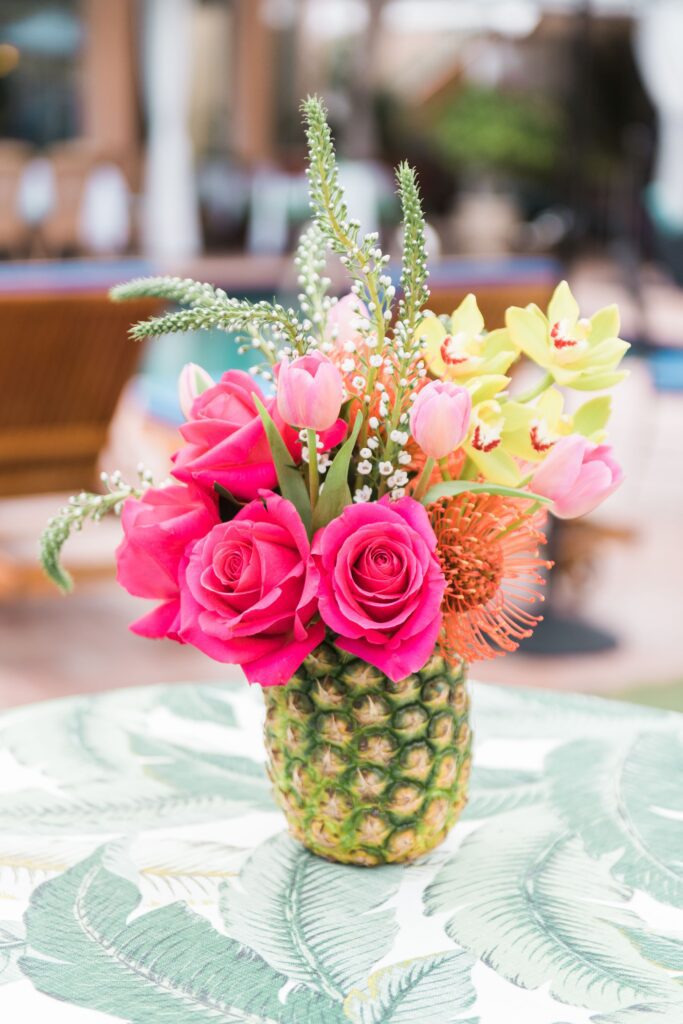 Pineapple floral decor for a luau party