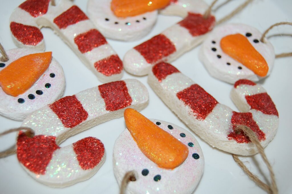 Salt dough snowmen and candy cane ornaments